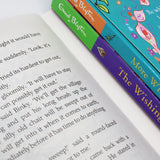 Photo of The Wishing Chair 3 Books Collection Pages by Enid Blyton on a White Background