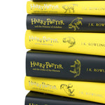 Photo of Harry Potter Hufflepuff House Collectors Edition Spines by J.K. Rowling on a White Background