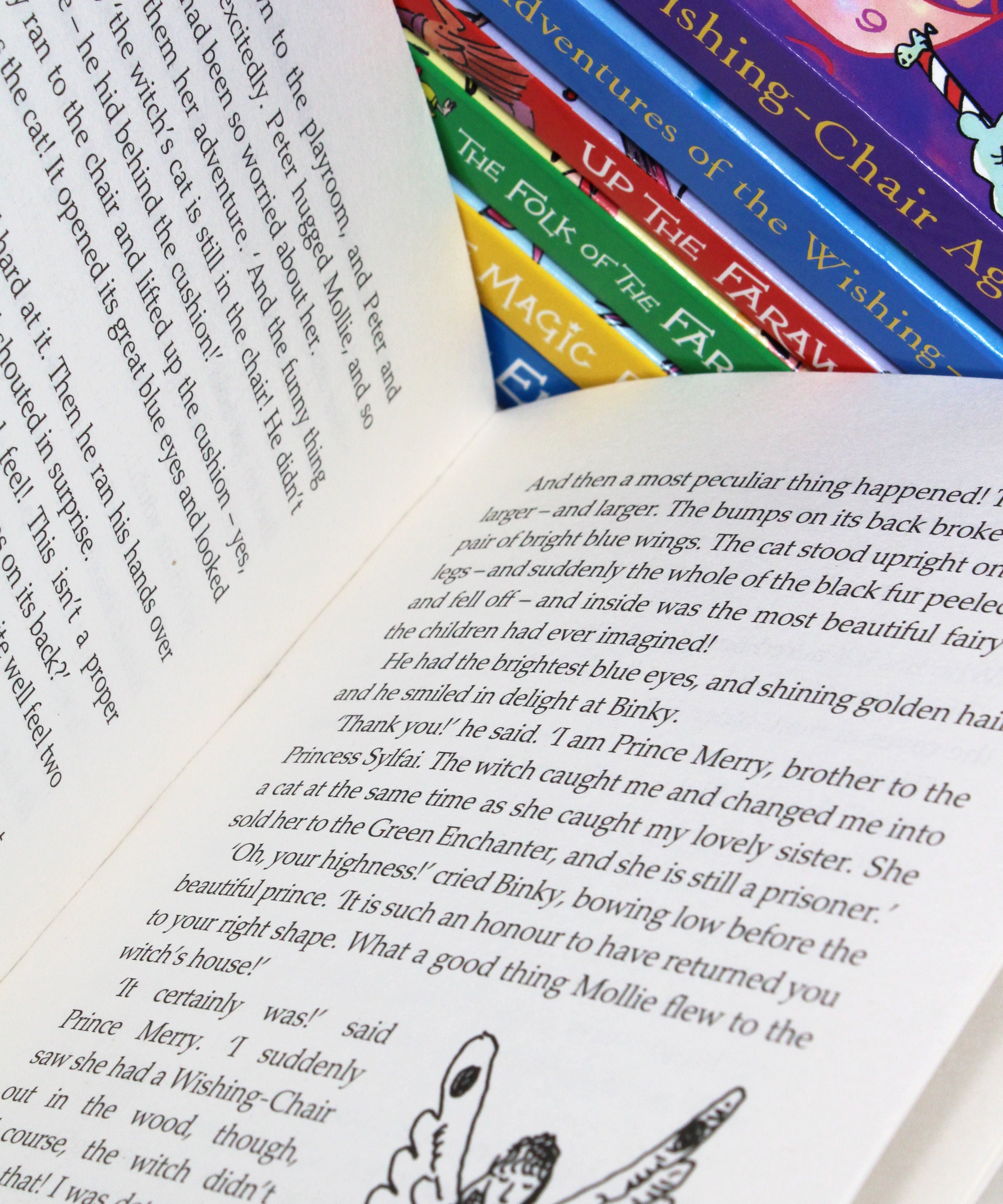 Photo of The Magical Worlds Complete Collection 7 Books Box Set Pages by Enid Blyton on a White Background