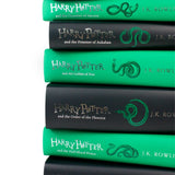 Photo of Harry Potter Slytherin House Collectors Edition Spines by J.K. Rowling on a White Background